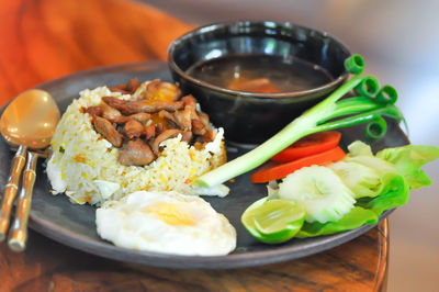 Close-up of food served on table