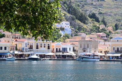 Boats moored in sea