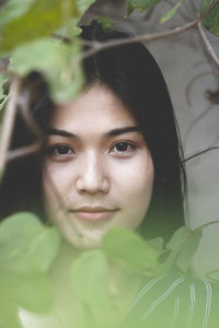 Close-up portrait of young woman