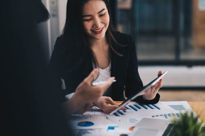 Young woman using mobile phone