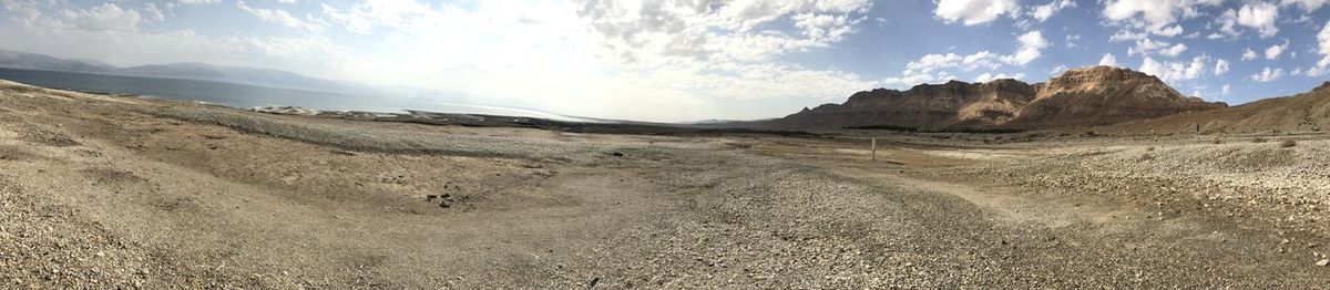 Panoramic view of desert against sky