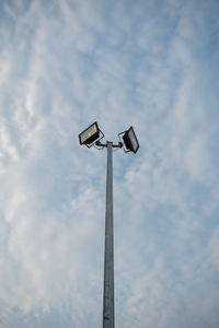 Low angle view of street light against sky