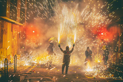 Firework display at night
