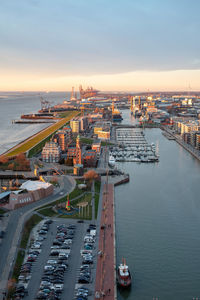 High angle view of commercial dock against sky during sunset