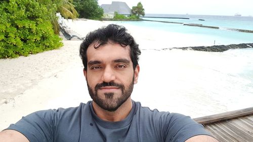 Portrait of mid adult man in water