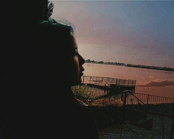 Woman looking at sunset