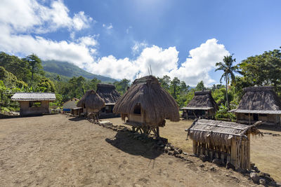 Panoramic view of houses and buildings against sky