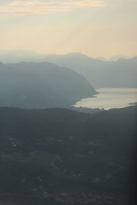 Scenic view of mountains against sky during sunset