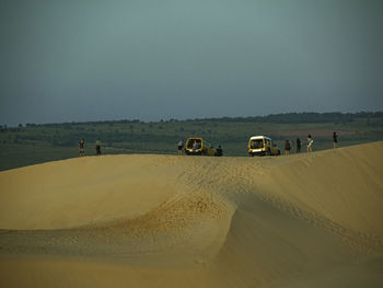 Scenic view of desert against sky