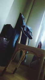 High angle view of shoes on chair at home