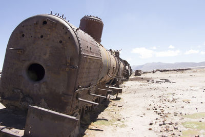 Wreck of steam engine at train cemetery