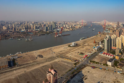 High angle view of buildings against sky