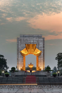 View of illuminated sculpture at sunset