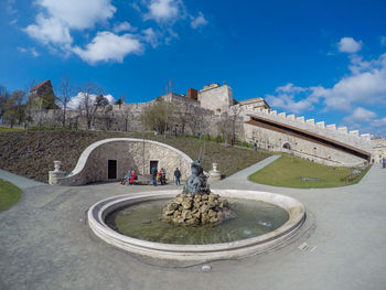 View of historical building against cloudy sky