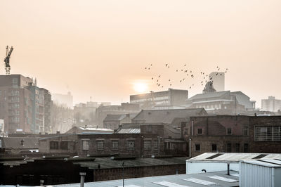 View of cityscape at sunset