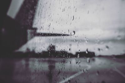 Close-up of wet window in rainy season