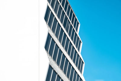 Low angle view of modern building against clear sky