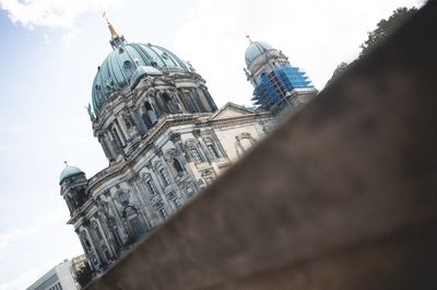 Low angle view of buildings against sky in city