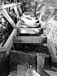 Low section of man on wooden floor