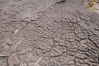 Full frame shot of cracked footpath