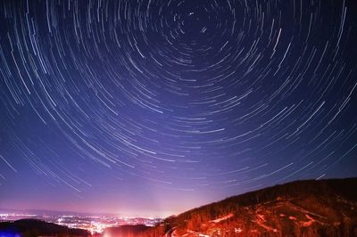 Low angle view of stars in sky at night