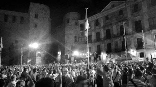 High angle view of people on street at night