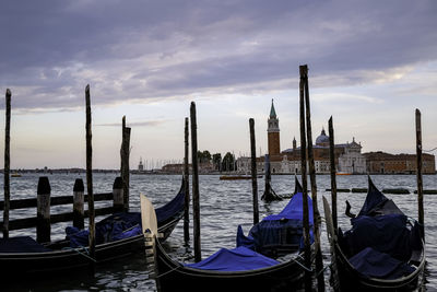 Gondolas at piazza san marco with san giorgio maggiore church in the background 