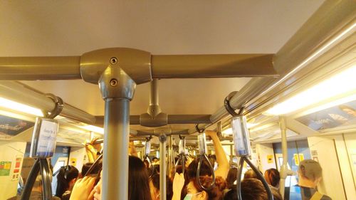 Low angle view of people in corridor