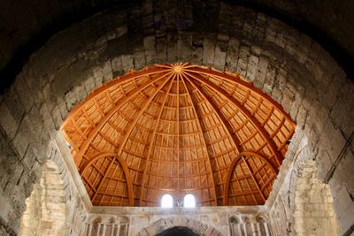 Low angle view of illuminated dome in temple