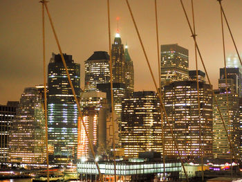 View of skyscrapers lit up at night