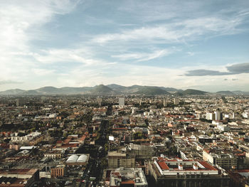 High angle shot of townscape against sky