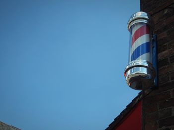 Low angle view of traditional barber pole