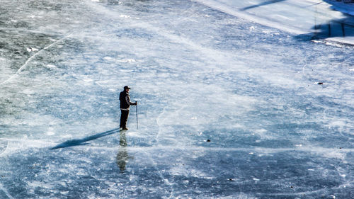 High angle view of person standing in snow