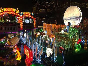Illuminated lanterns hanging at night