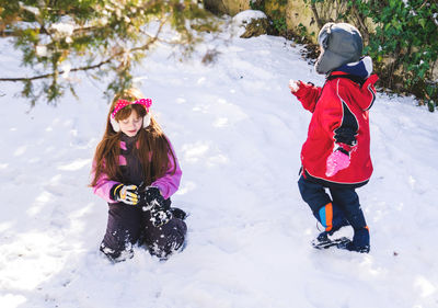 Children playing on snow