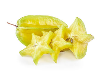 Close-up of lemon slice against white background