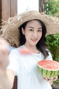 Portrait of woman wearing hat