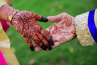 Close-up of woman hand with umbrella