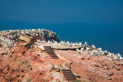 Panoramic view of sea against blue sky