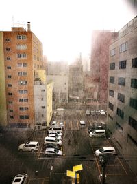 High angle view of cars on road against sky