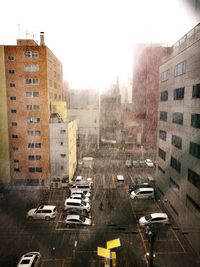 High angle view of cars on road against sky