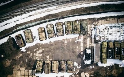 Directly above shot of abandoned armored tanks in snow