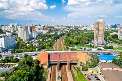 High angle view of buildings in city against sky