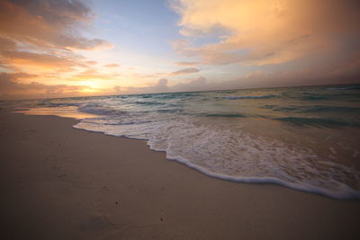 Scenic view of beach during sunset