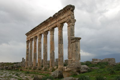 Old ruin building against cloudy sky