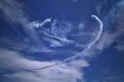 Low angle view of vapor trail in sky