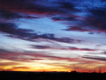 Scenic view of landscape at sunset