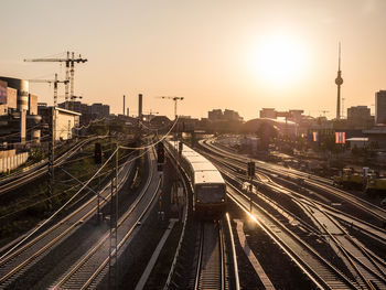 View of berlin and train tracks during golden hour