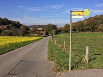 Road passing through field