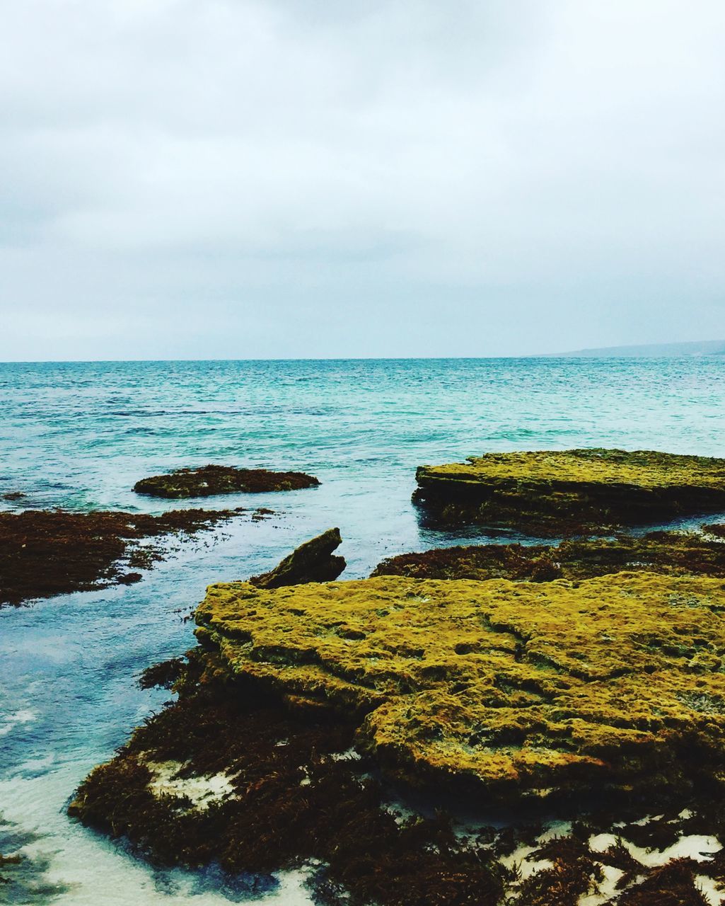 sea, water, horizon over water, tranquil scene, scenics, sky, tranquility, beauty in nature, nature, rock - object, idyllic, cloud - sky, beach, shore, remote, outdoors, cloud, day, non-urban scene, no people